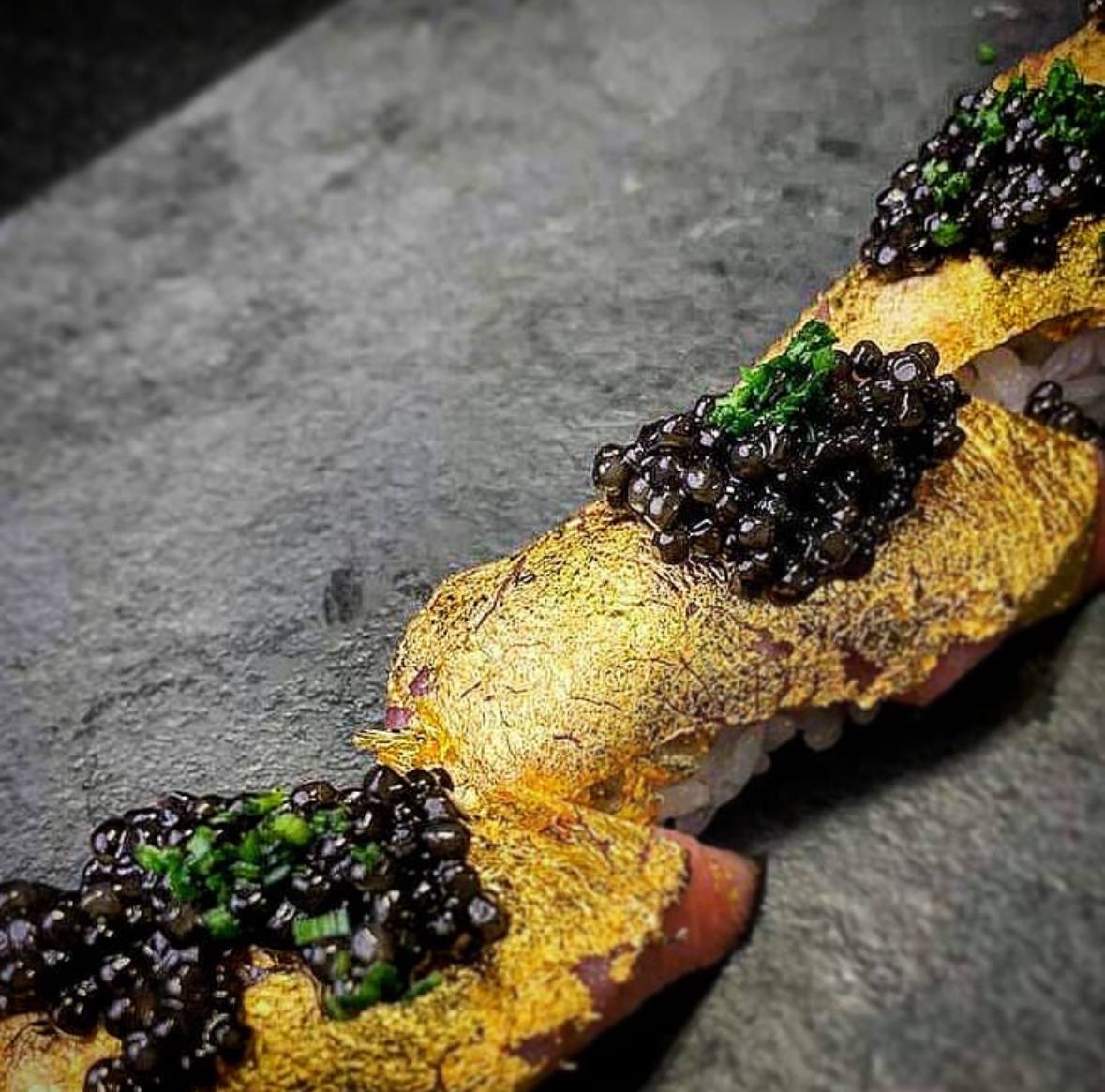 Gold leaf sushi roll with caviar