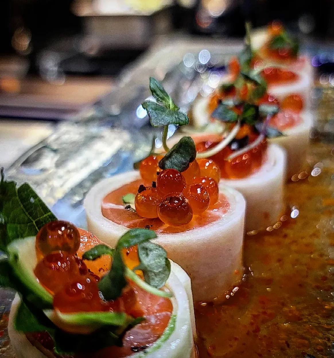 Ikura topped maki rolls