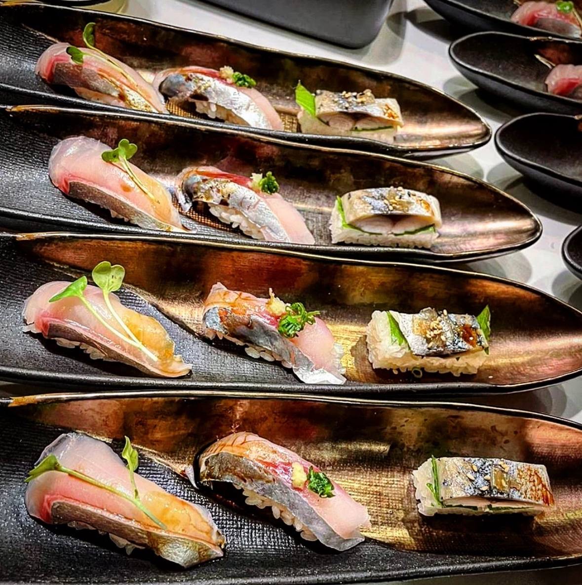 Nigiri on elegant boat plates
