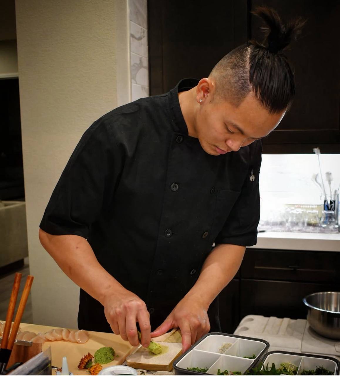 Chef Roman preparing sushi at his station