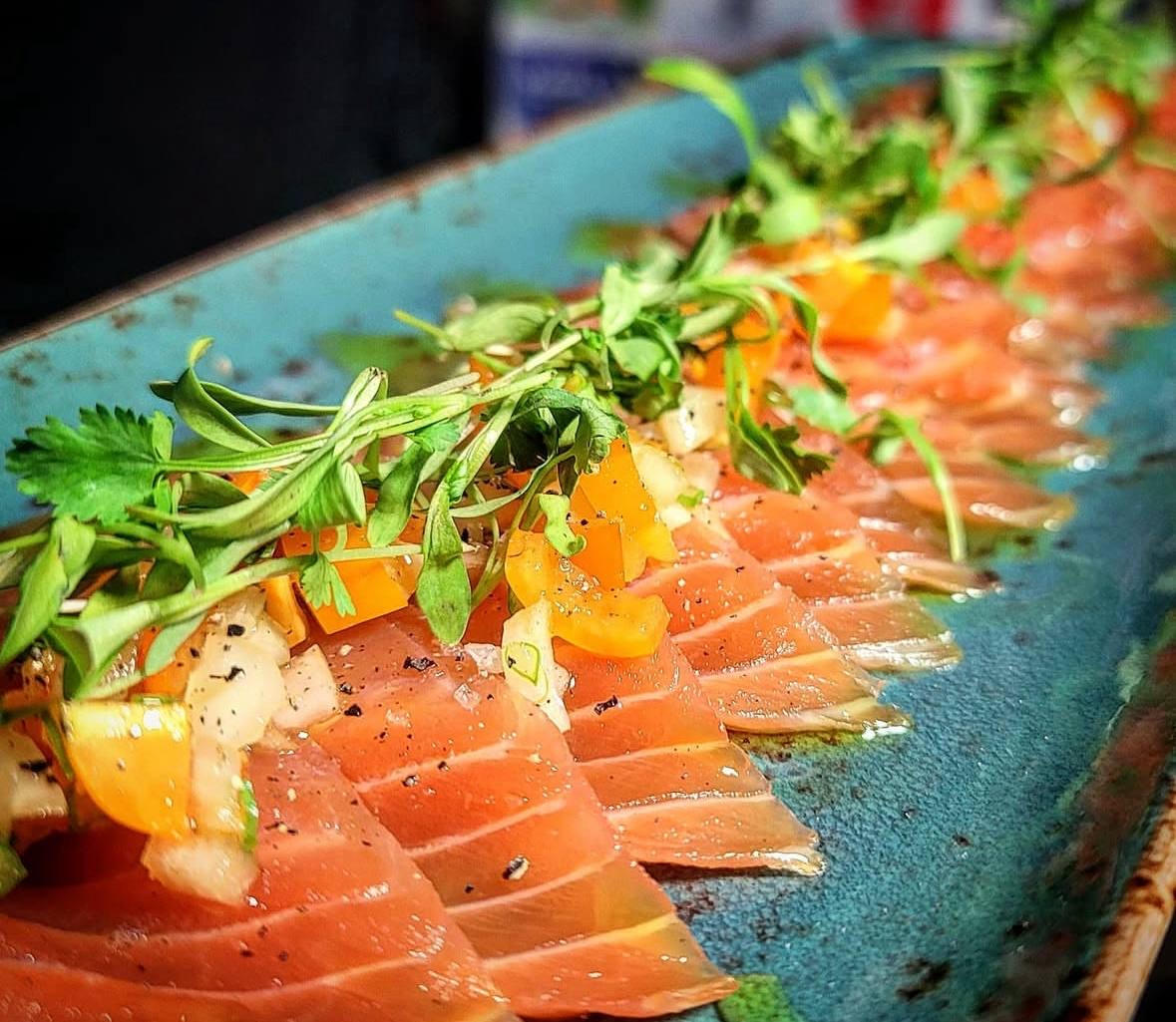Salmon carpaccio with herbs