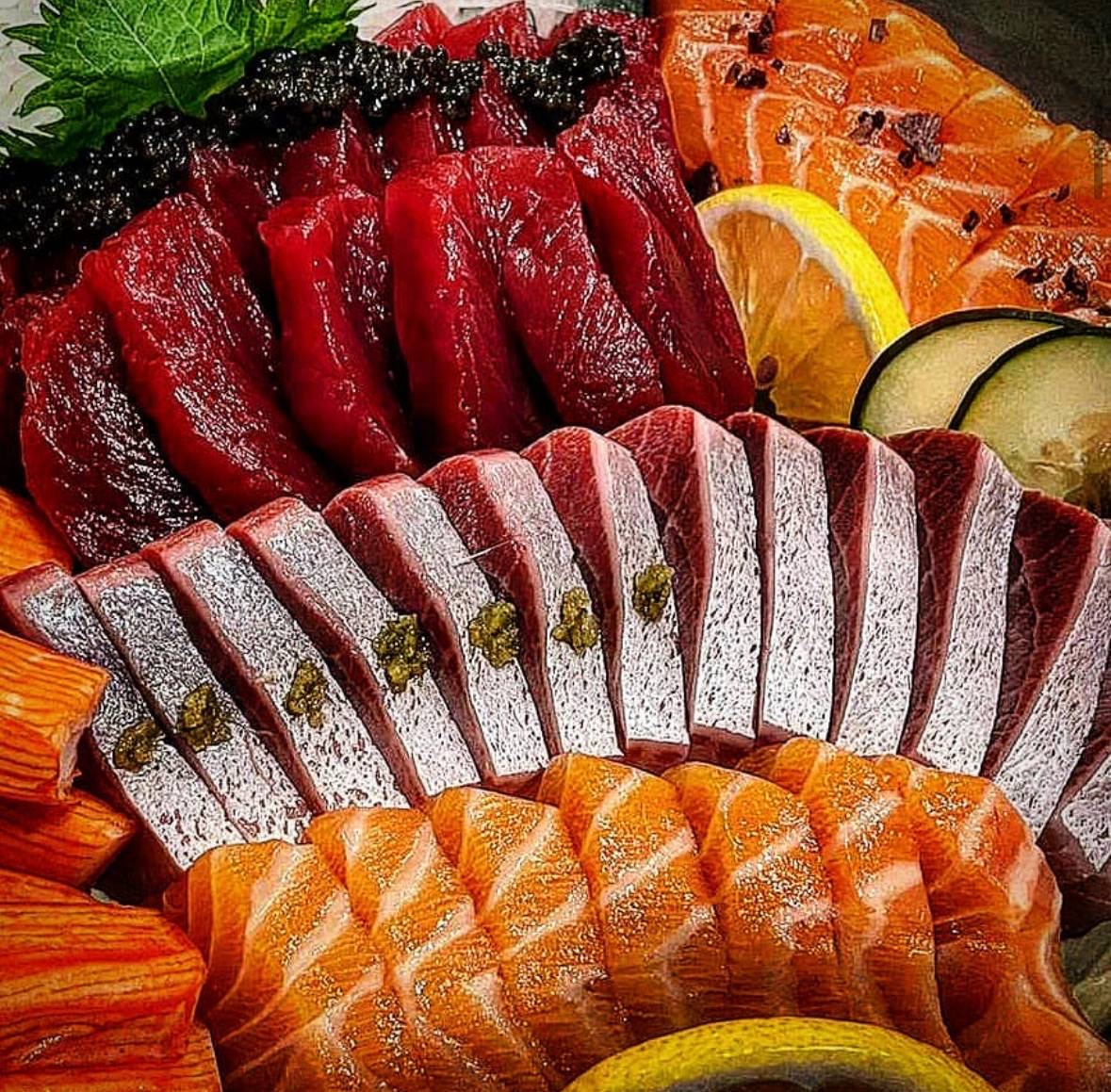 Tuna, salmon, and yellowtail sashimi