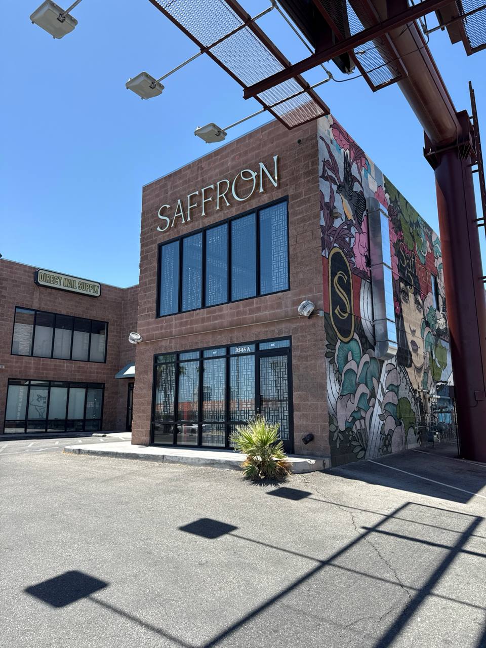 Saffron Lounge exterior with mural